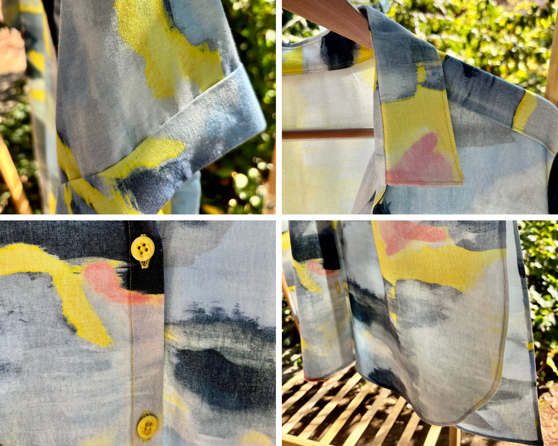 Nähdetails des Palmer Woven Dress mit Kragen, Ärmelaufschlag, Knopfleiste und abgerundetem Saum