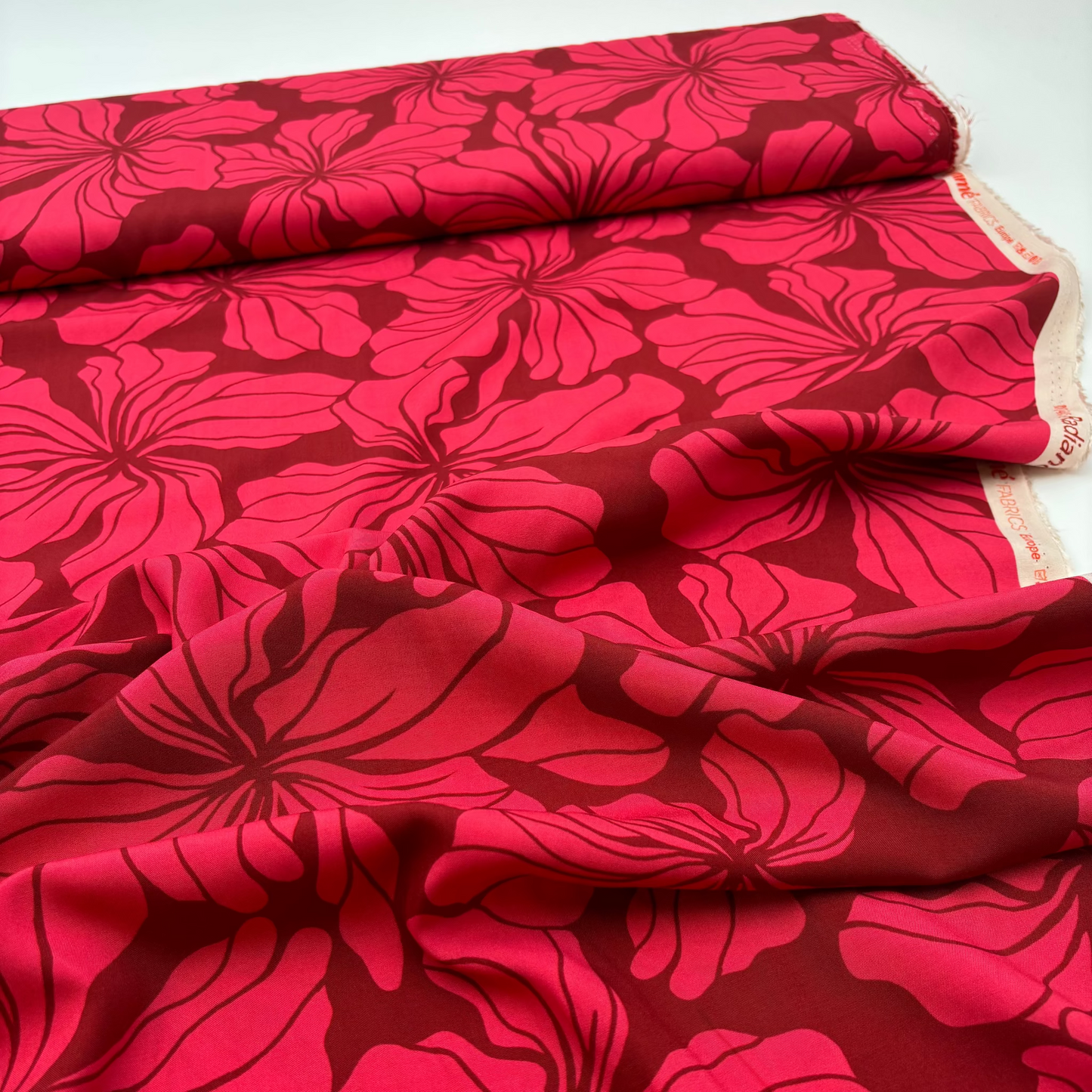 Viskosestoff mit abstraktem Blumenmuster - Rot, (Meterware)