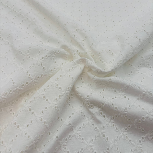 Baumwolljersey mit Lochstickerei, Broderie Anglaise – 100% Baumwolle, Wollweiß (Meterware)