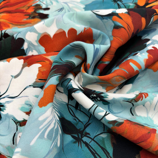 Rayonstoff - blau mit gebranntorangem Blumenmuster (Meterware)
