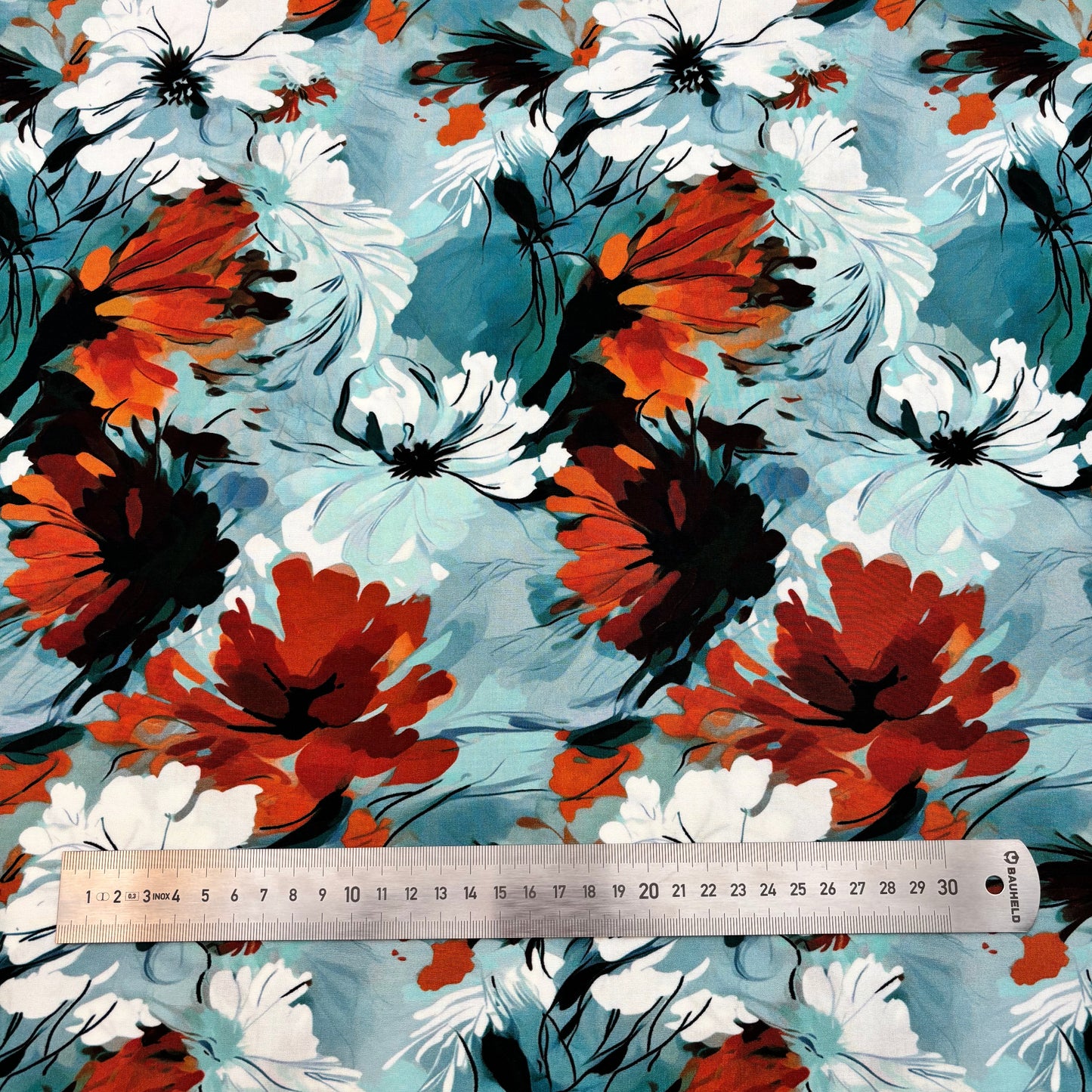 Rayonstoff - blau mit gebranntorangem Blumenmuster (Meterware)